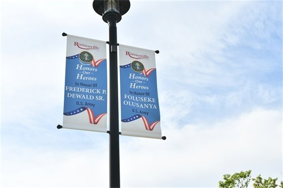 Picture of 2025 Veterans Banners hanging in the Village